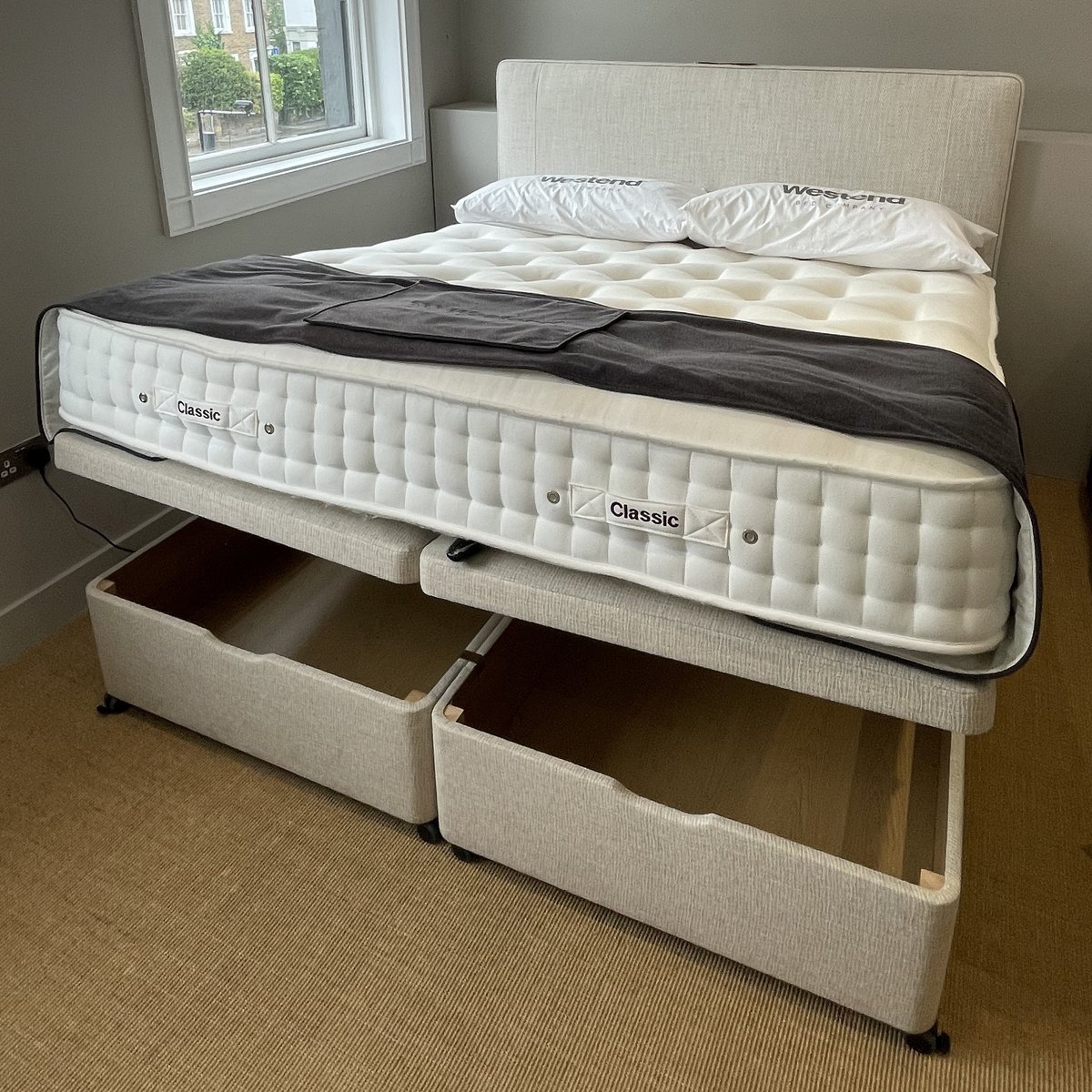 Westend Classic electric ottoman divan set with Calpe headboard, storage open